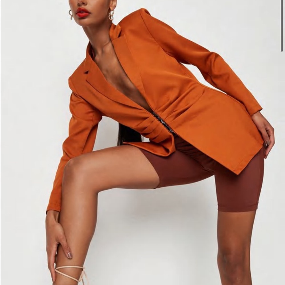 Orange hook eye fastening blazer